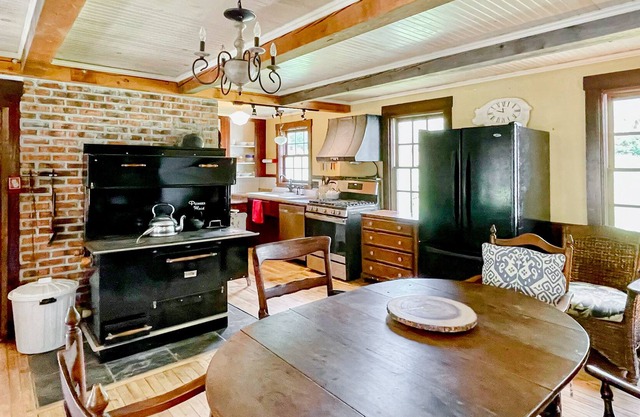 Antique dog-friendly farmhouse with private sauna, washer/dryer, grill, and AC