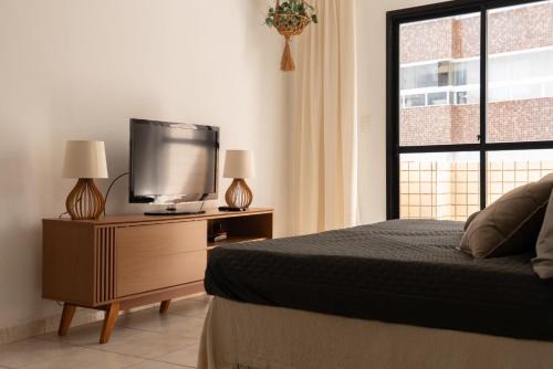 Apartamento completo com garagem a 150 m da praia