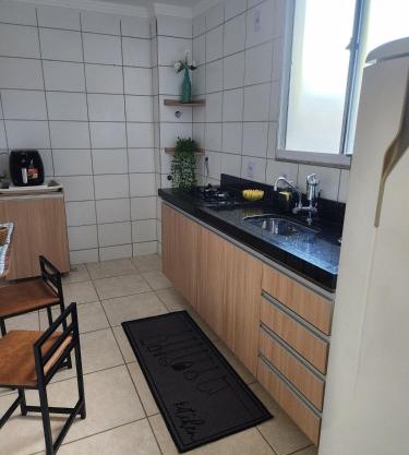 Apartamento confortável com garden