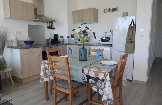 Apartment located on the ground floor of a small residence with four
