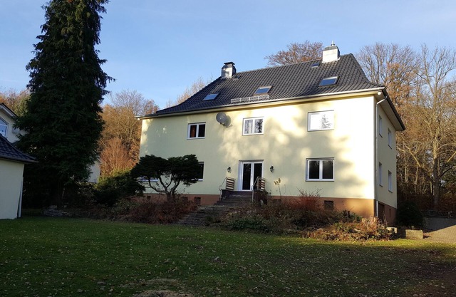 Apartment near the forest with a large garden with playground and fire pit