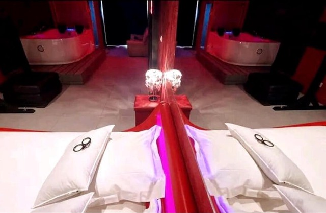 Appartement balnéo et sauna privés The Red Room