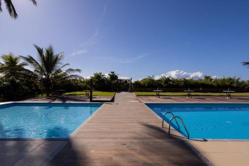 Apt em Condomínio pé na areia - Praia da Perola