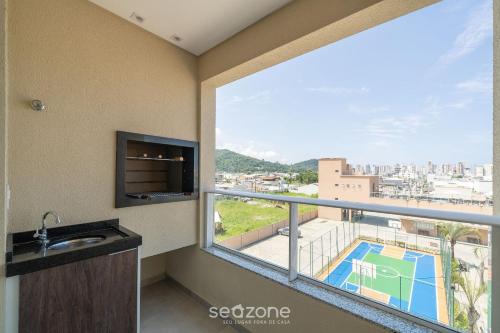 Apto 2Q c/varanda e piscina em Itapema RSN301