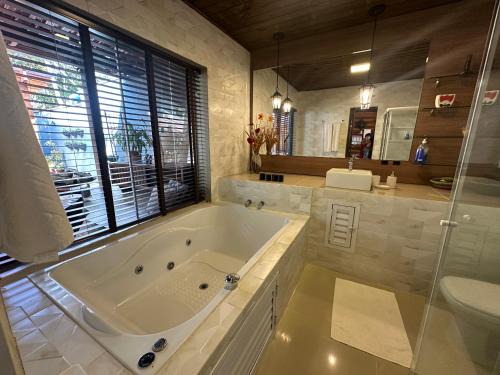 Arthi - LINDO LOFT RECANTO DOS PASSARINHOS com HIDROMASSAGEM!