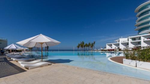 Beachfront Luxury New Vallarta Aria Ocean 176 by Kivoya