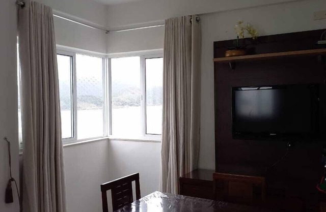 Beautiful apartment, overlooking the sea at Ponta da Praia with Internet Access