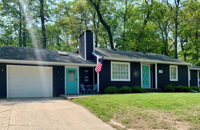 Beautiful lake-access home with boat slip steps away from renowned Clark Lake!