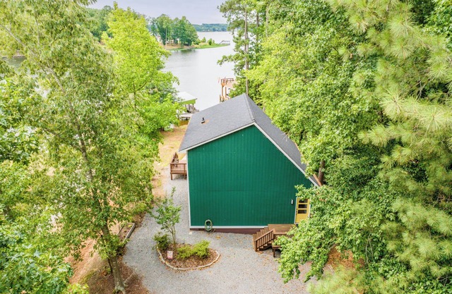 Beautiful lake front cottage, deep water lot with covered dock and amenities.