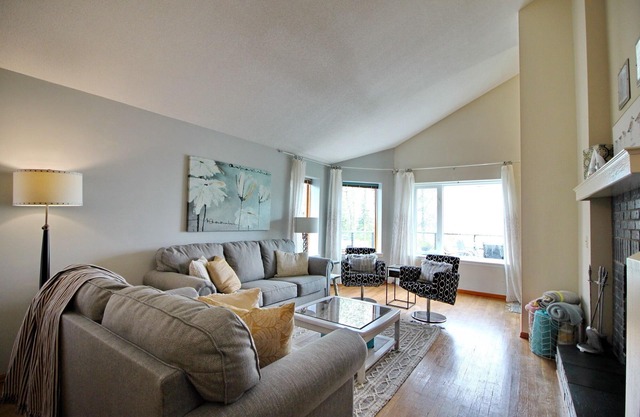 Beautiful Sylvan Lake waterfront property with unobstructed beach access.