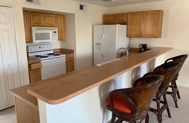 Best location at beach! 3/2 TH 2 ocean view balconies. Modern!