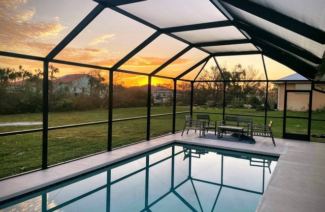 Canal home, heated pool, close to everything!