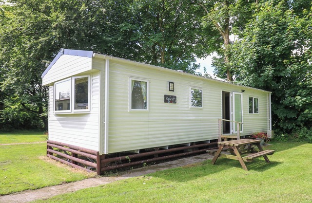 CARAVAN 6 AT BLACKMOOR FARM, pet friendly, with a garden in Tenby