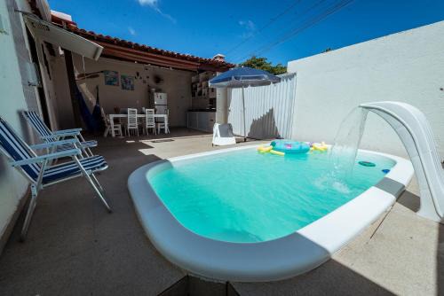 Casa c 4 suites, Piscina, Churrasqueira e Garagem