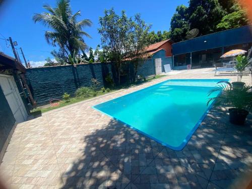Casa com Piscina Privativa em Bertioga 2 Suítes e Wi-Fi Bem próxima à praia