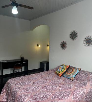Casa com quarto e suíte