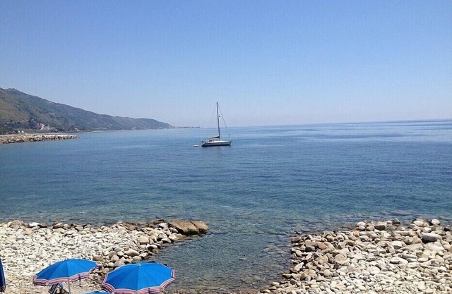 Casa Panna A: A cheerful apartment that is part of a small villa located right on the beach, with Free WI-FI.