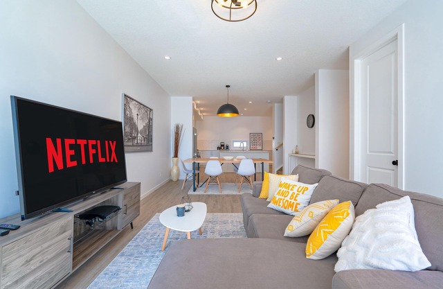 Central, Family-sized 3 BR Townhome with AC, Work Space & Private Parking