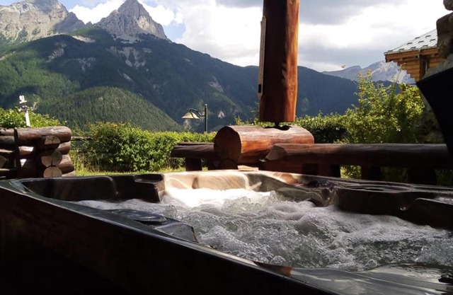 Chalet en rondin 8 pers. avec sauna, SPA et garage, près télécabine et navette à Praloup 1500 - FR-1-165A-126