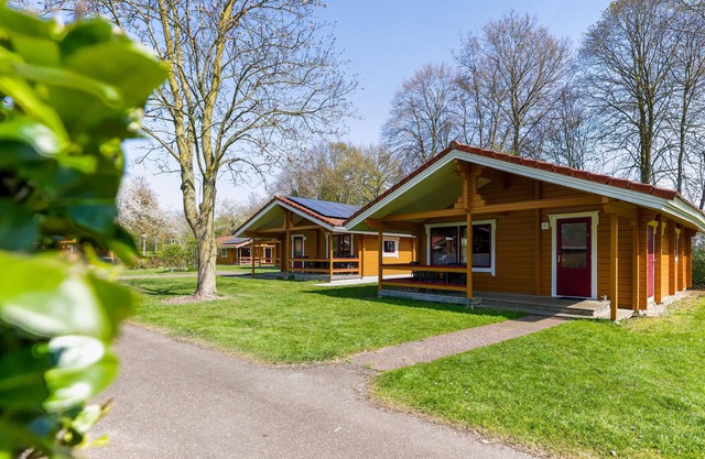 Chalet in a park with indoor and outdoor pool
