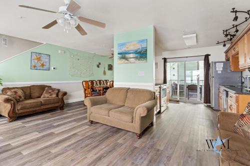 Charming 3-Bedroom, 2-Bathroom Townhouse Perfectly Located Near the Boardwalk