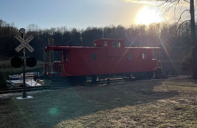 Charming Caboose-turned-tiny home on lake