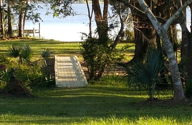 Charming, historic riverfront lodge on 7 wooded acres with 6 bedrooms