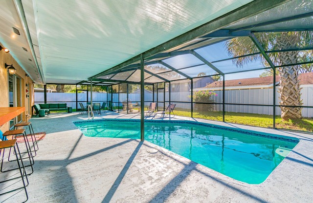 Charming home with amazing heated pool! Close to Airport, Beaches & Attractions.