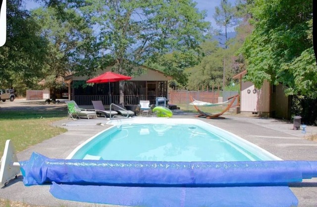 Charming secluded 2-bedroom home in Hawkins Bar with pool and is pet friendly