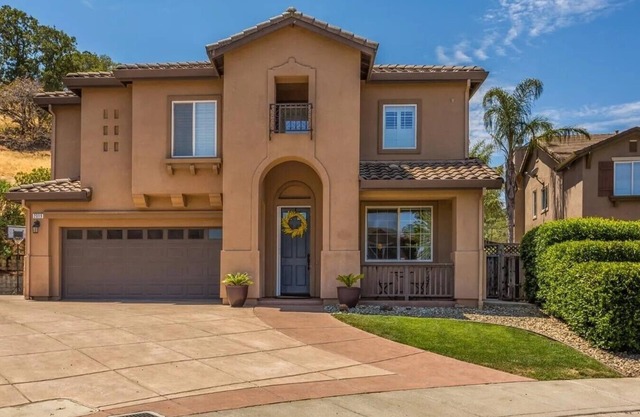 Clean and cozy bedroom in a beautiful Semi Custom home.