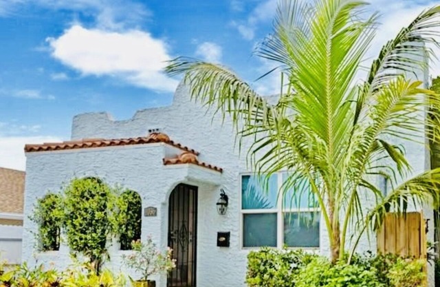 Close to beach & shopping & airport Charming Mission Style Home built in 1926.