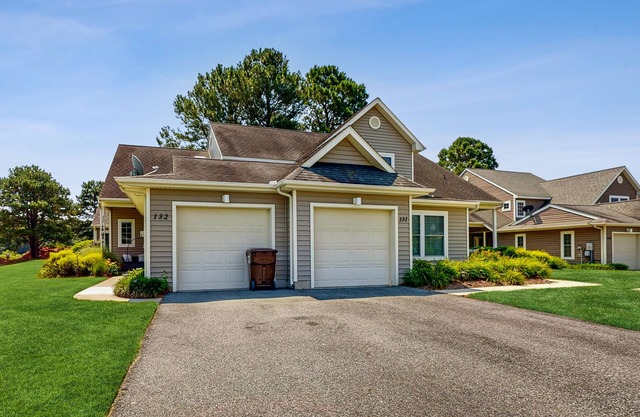 Coastal resort with pool, golf, fireplace, W/D, sunroom & beach access