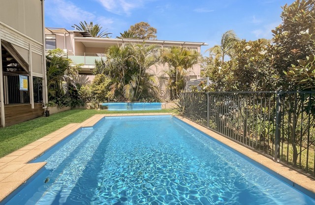 Coastal Upper-Level Home with Pool Access