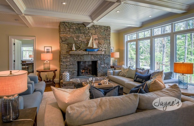 Coastal vibes at this 8bdrm 6bath cottage on Kennisis Lake. Sauna!