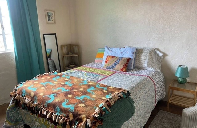 Colorful & cozy adobe perched up in Chihuahua Hill with great views!