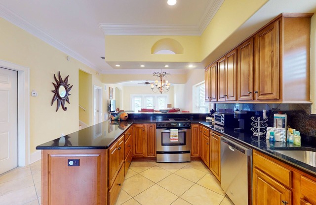 Colorful end unit townhome with resort amenities, sound views, W/D, & AC