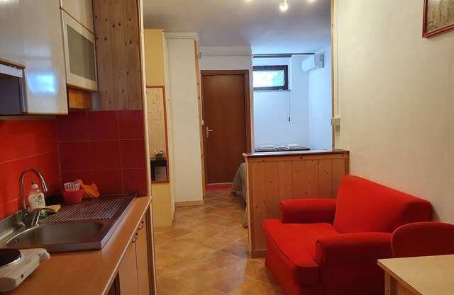 Comfortable mini-apartment surrounded by the greenery of a large garden.