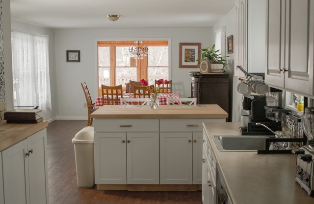 Comfy family-friendly log-sided home with lake frontage and dock