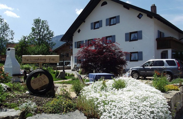 Cosy holiday apartment in a farmhouse with balconies facing north and south