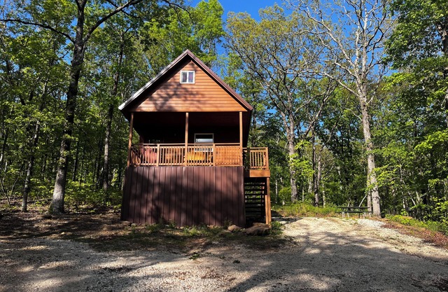 Cowboy Cabin is a quiet place to camp in the woods with the amenities of home.