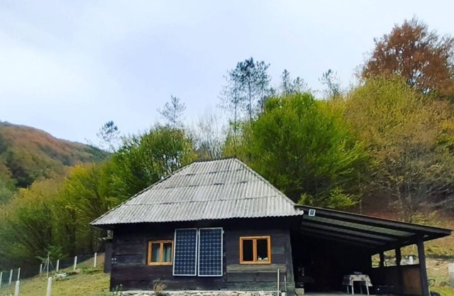 Cozy hut in the wild nature of Romania