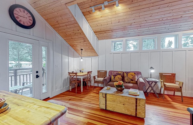 Cozy ocean view home with balcony, well-equipped kitchen, & fireplace