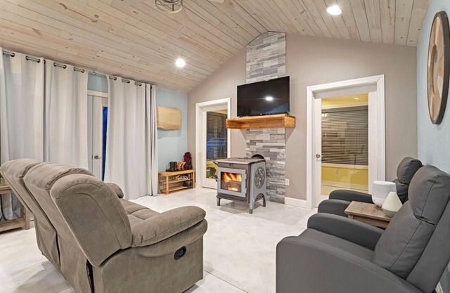 Cozy one level - open floor plan, split bedrooms, in-floor heat, wood stove