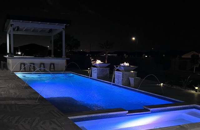 Custom 3500 sq ft home 4 BR 3.5 Ba Pool /10 person spa on 1 acre with RV hookup.