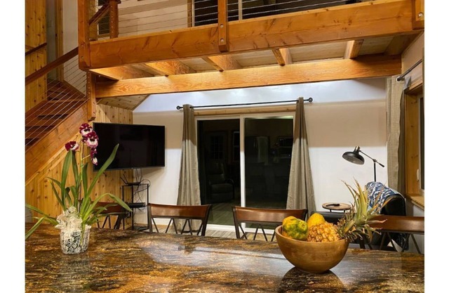 Custom cottage feels bright & airy yet cozy and private in this country setting.