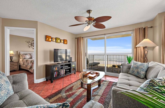 Direct oceanfront corner condo with stunning views, huge balcony, heated pool, and garage parking