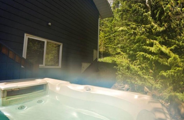 Dog friendly Home on Ski Hill with Hot Tub by StayIn