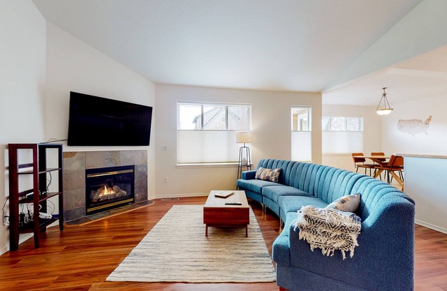 Dog-friendly home with enclosed yard, fireplace, W/D, central AC, & streaming