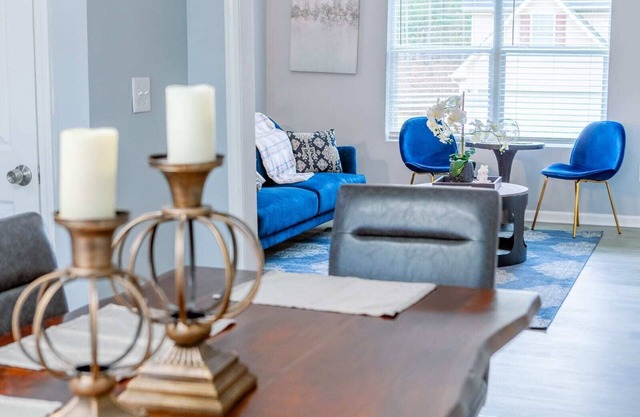 Elegant Haven: Stylish Interiors with Serene Deck Views and Modern Comforts