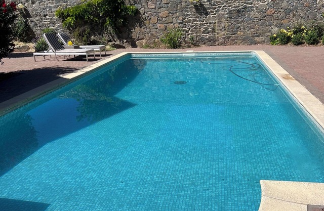 Elegant studio and tranquil pool, central location.